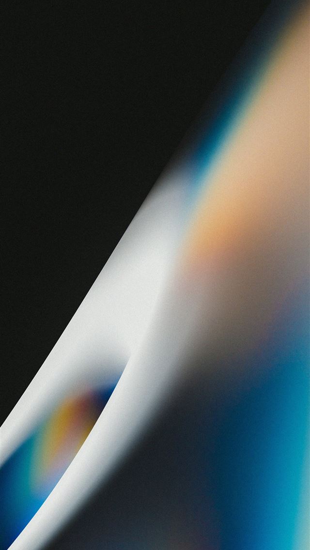 1290x2796 a close up of a white and blue object -  iPhone Wallpaper