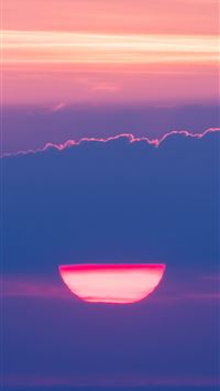 setting sun behind cloud 4k wallpaper