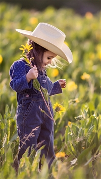 Lovely Little Girl and Flower wallpaper