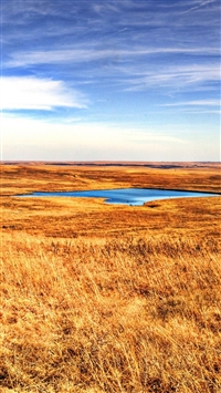 Desolate Grassland Lake Skyscape wallpaper
