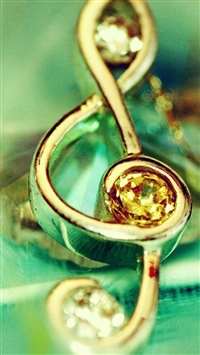 Golden Music Note Logo Decoration wallpaper