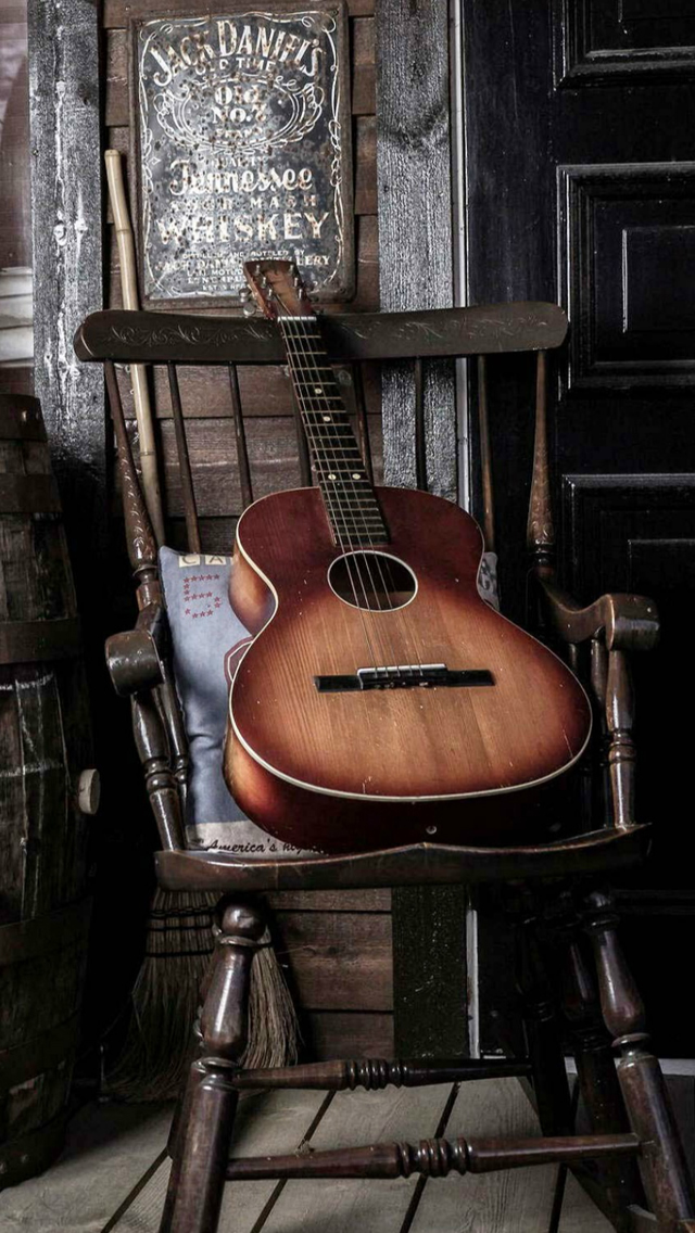 Old Guitar On Chair iPhone wallpaper 