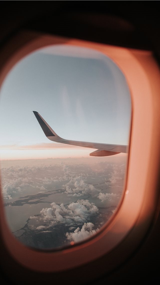 640x1136 white airplane - window iPhone Wallpaper