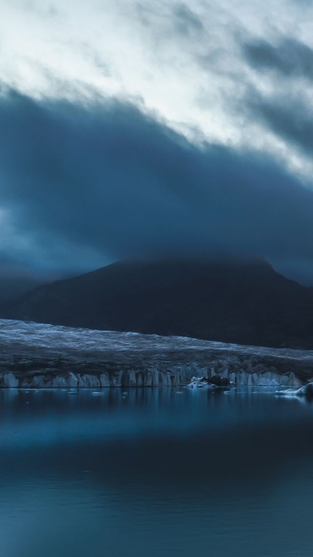640x1136 Water ice floes - dark clouds iPhone Wallpaper
