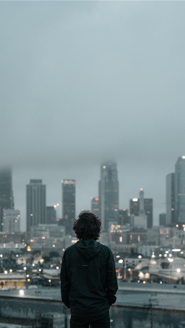 640x1136 person standing an looking down - metropolis iPhone Wallpaper