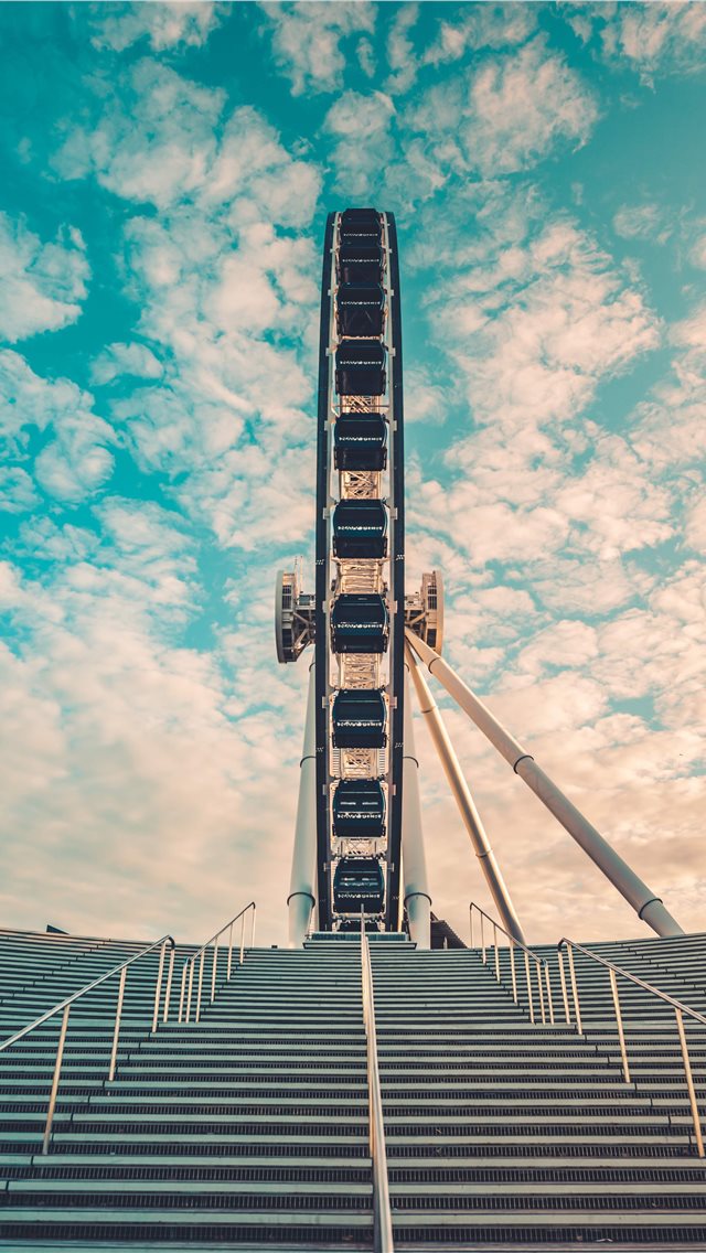 I took this shot walking past the Ferris Wheel fro... iPhone wallpaper 