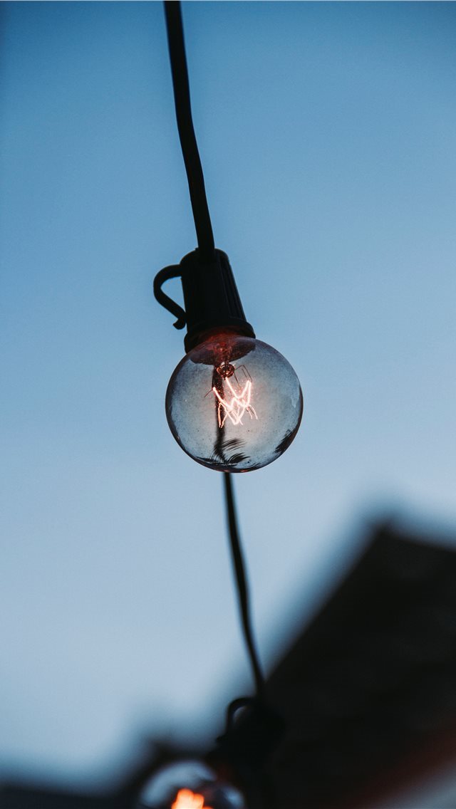 640x1136 Light Bulb - hand iPhone Wallpaper
