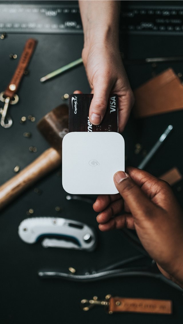 640x1136 person holding Visa card and white device -  iPhone Wallpaper