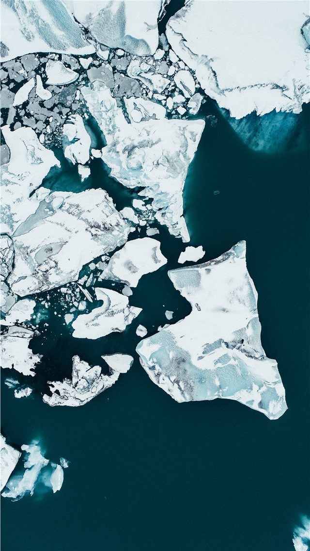 640x1136 white ice on body of water during daytime - iceland iPhone Wallpaper