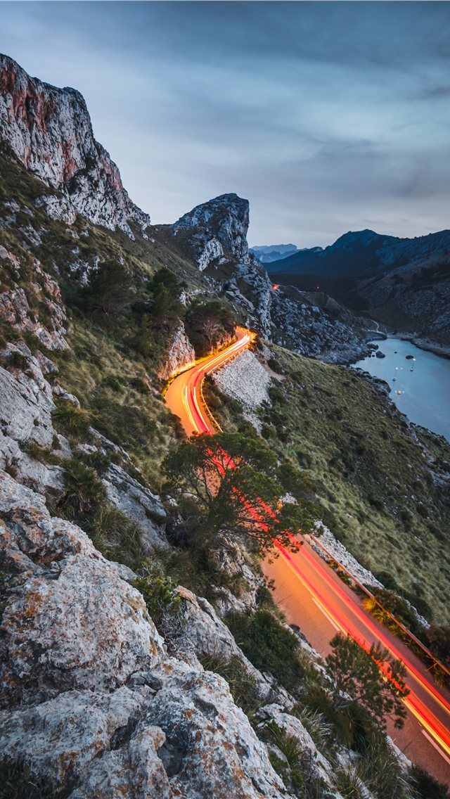 640x1136 road beside a cliff near body of water during dayt... - mountain iPhone Wallpaper
