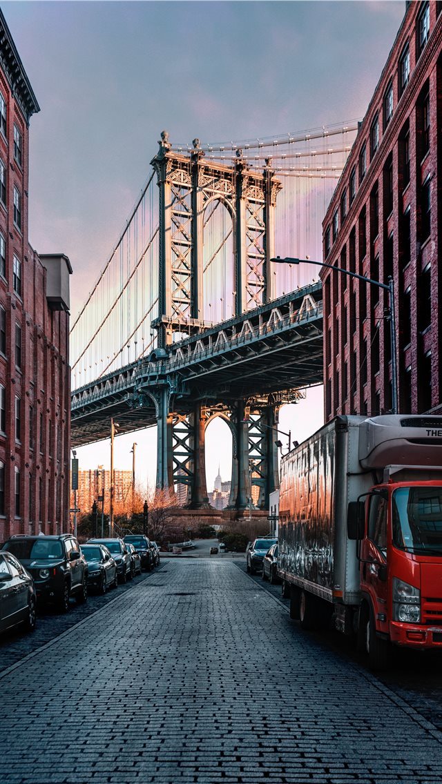 640x1136 cars parked on both sides of street near bridge - teal iPhone Wallpaper