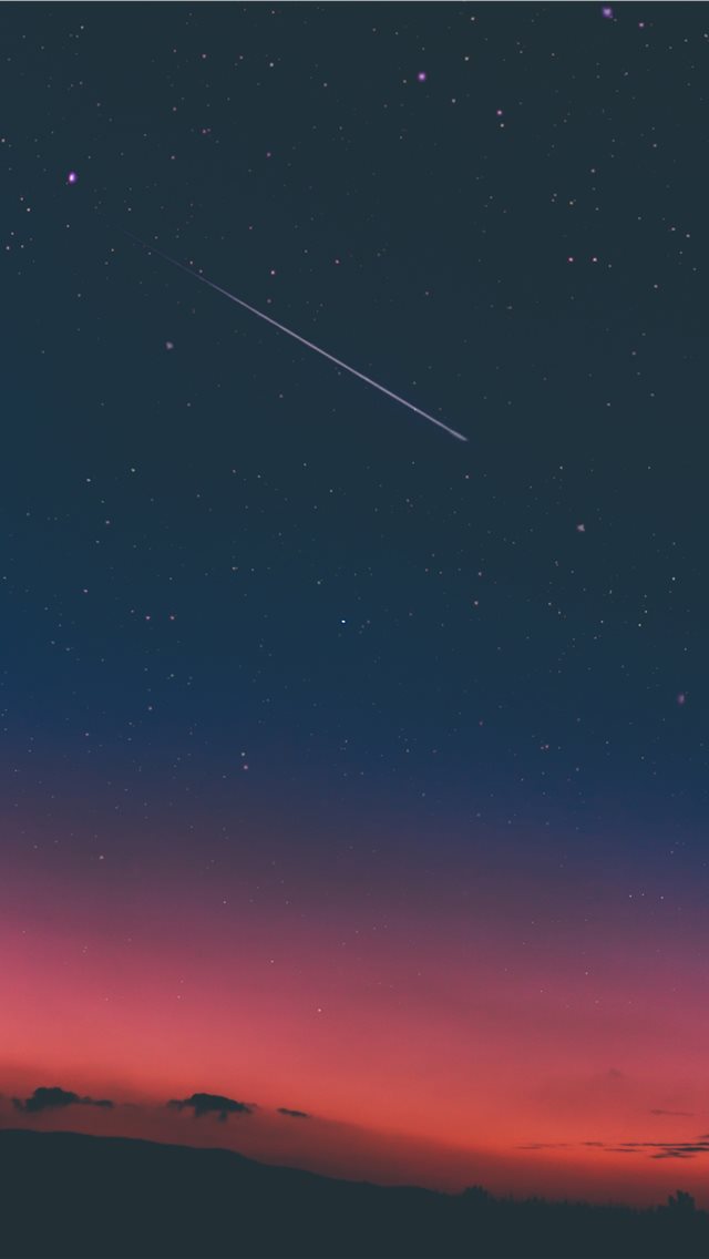 shooting star in night sky iPhone wallpaper 