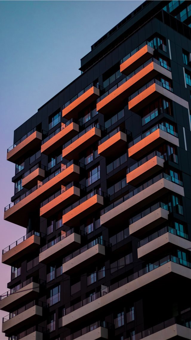 640x1136 low angle photo of high rise building - brussels iPhone Wallpaper