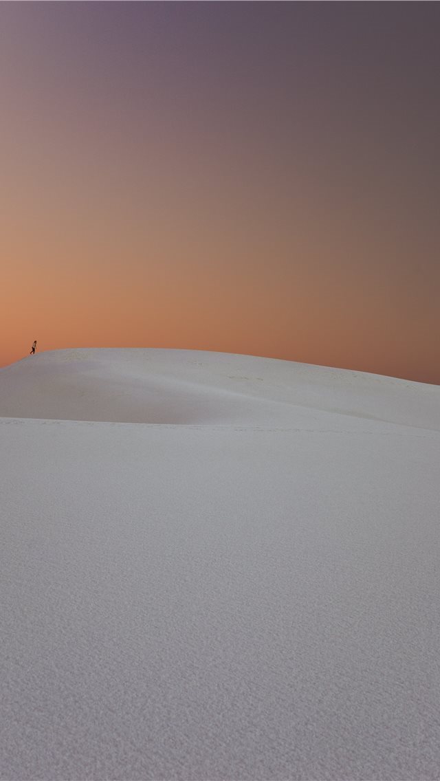 640x1136 person walking in the desert dunes - white sands national monument iPhone Wallpaper
