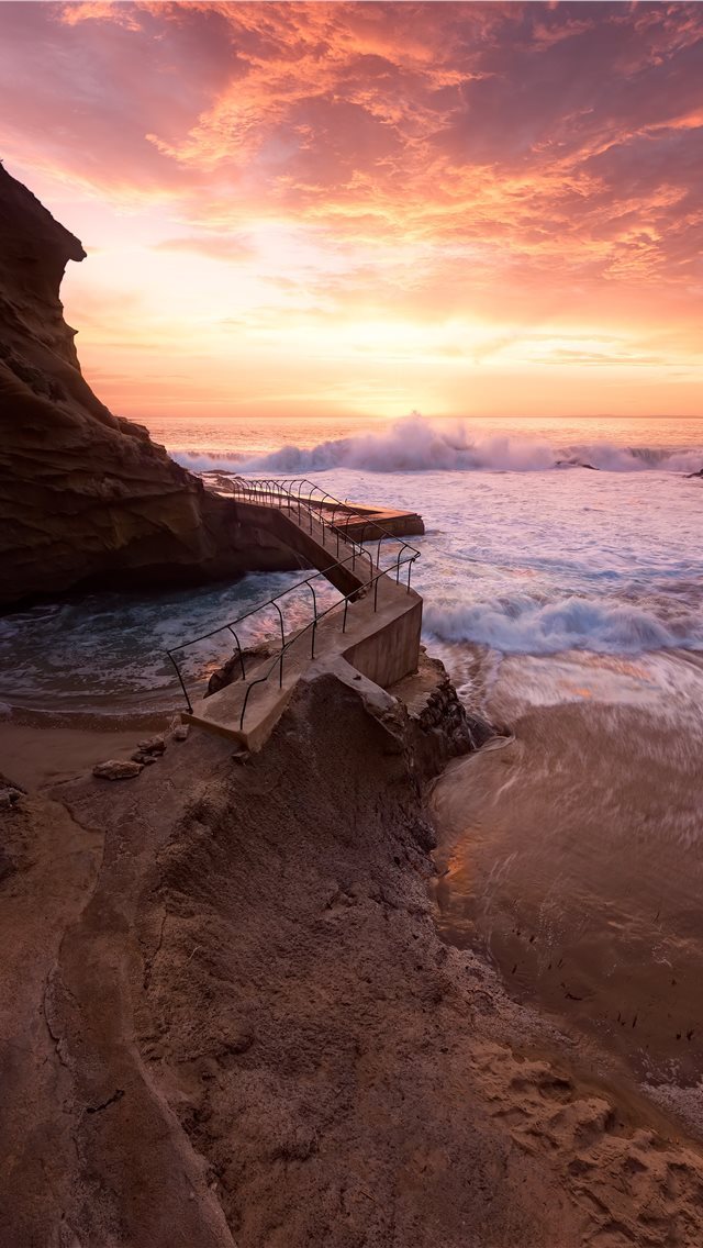 640x1136 waves crashing on rocky coast during sunset - united states iPhone Wallpaper
