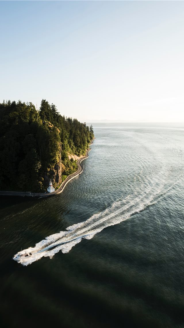 640x1136 white speedboat passing on sea under clear blue sk... - canada iPhone Wallpaper
