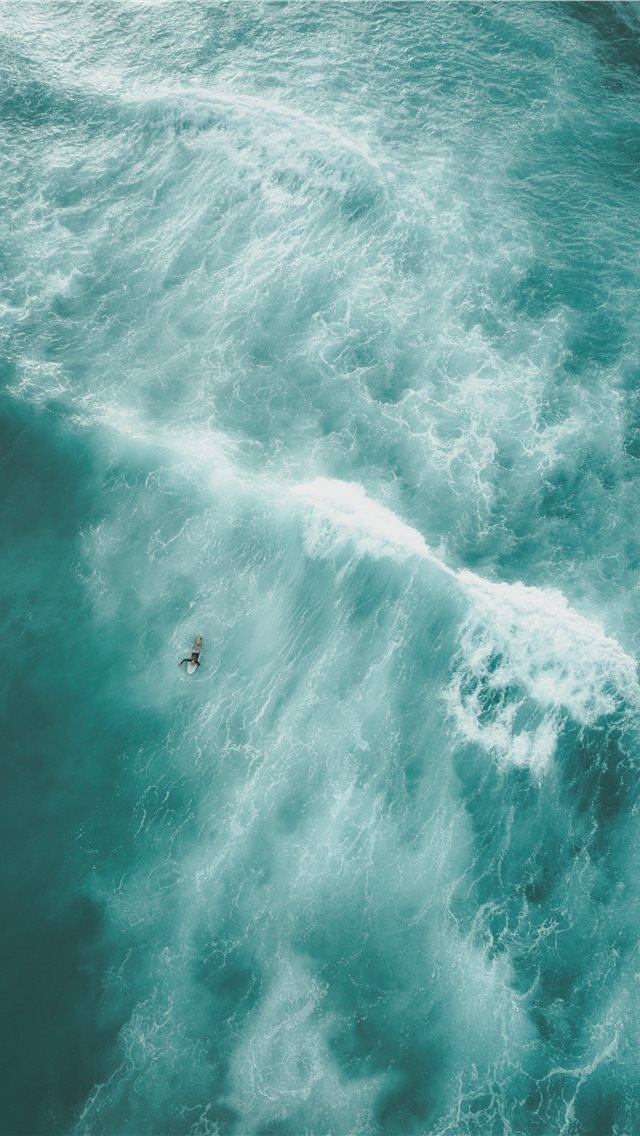 640x1136 birds eye view photo of a person on body of water - bondi beach iPhone Wallpaper