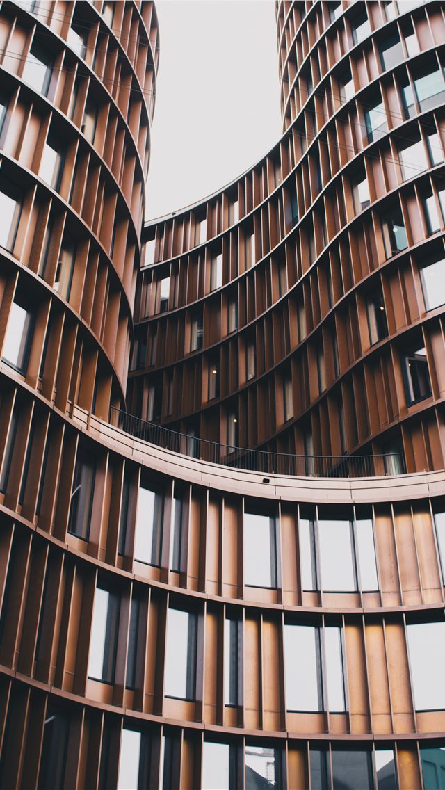 640x1136 close up photography of brown concrete building - denmark iPhone Wallpaper