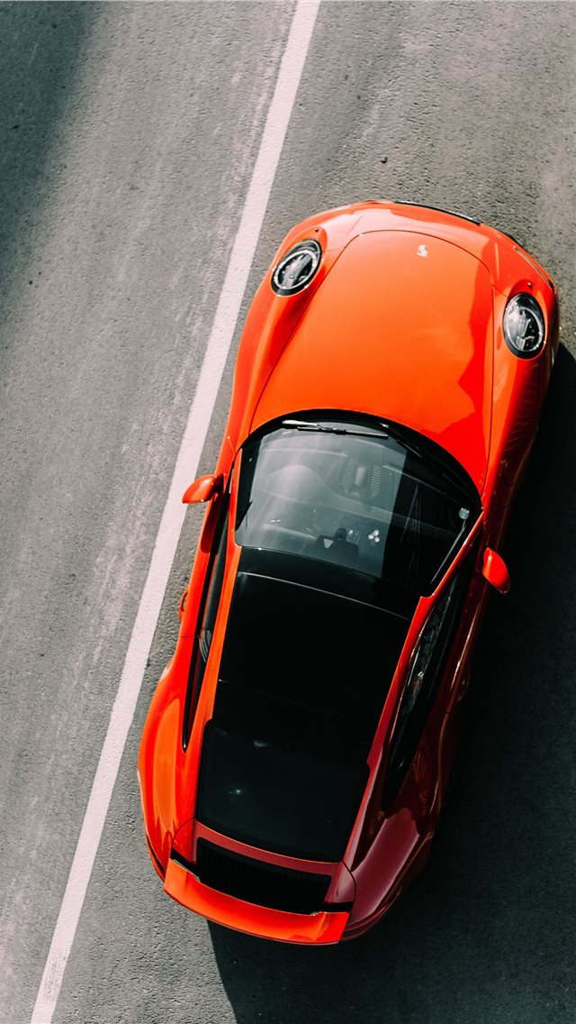 640x1136 orange vehicle on road close up photography - car iPhone Wallpaper