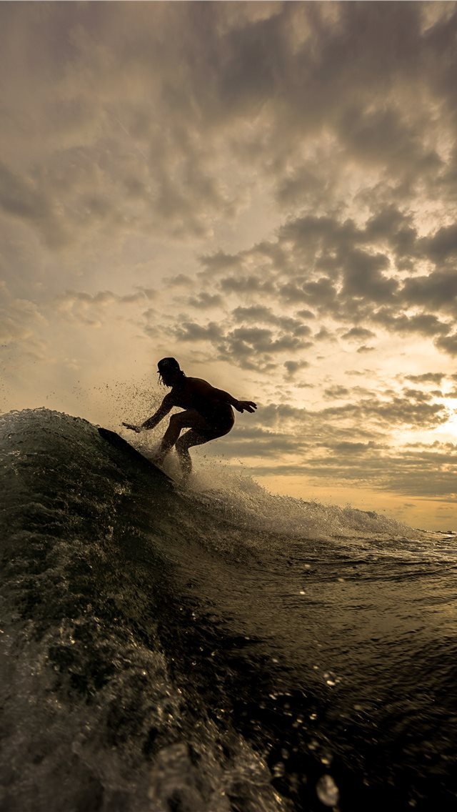 640x1136 silhouette of person riding on surfboard -  iPhone Wallpaper