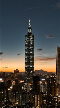 black high rise building wallpaper