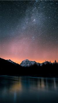 lake surrounded by trees and mountain under milky ... wallpaper