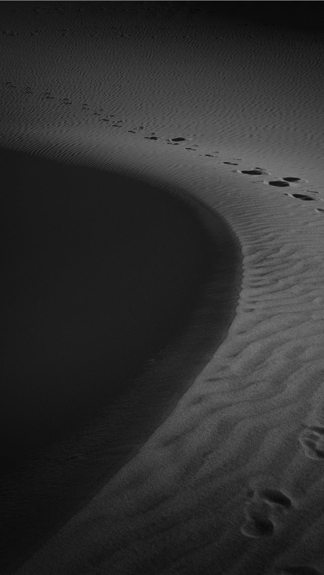 footprints on sand iPhone wallpaper 