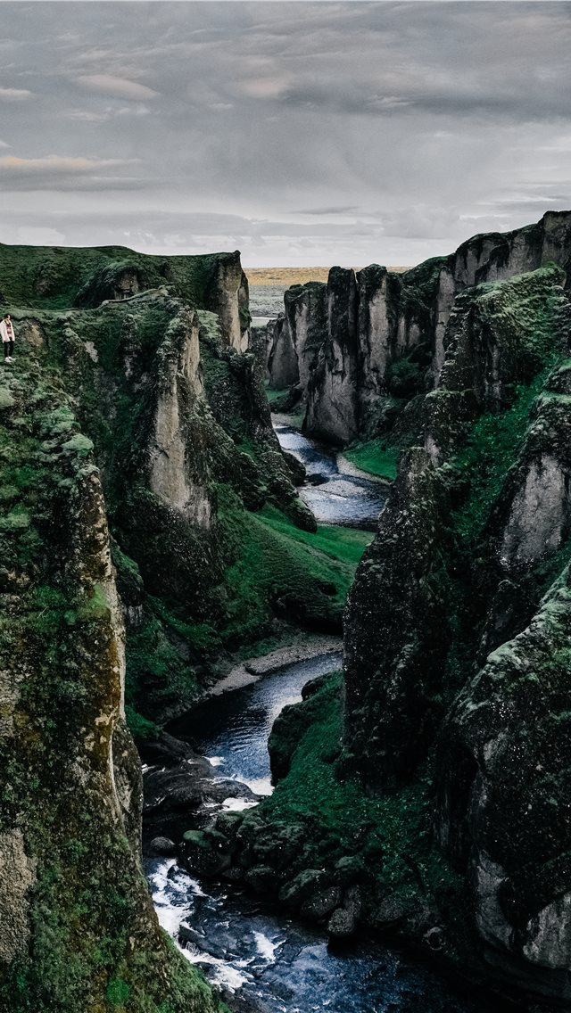 river surrounded by rock formation iPhone wallpaper 