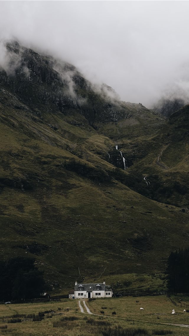 640x1136 landscape photography of house under mountain - united kingdom iPhone Wallpaper