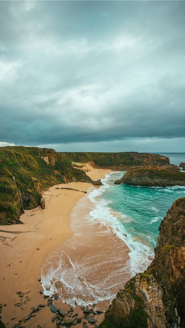 640x1136 seashore aerial view photo during daytime - spain iPhone Wallpaper