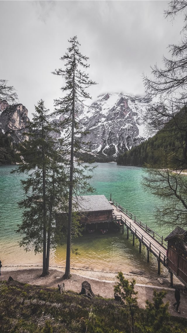 640x1136 person standing near body of water -  iPhone Wallpaper