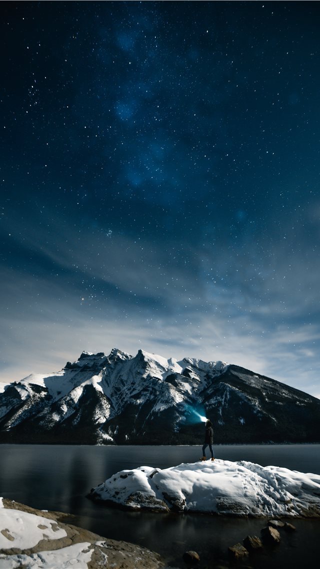 640x1136 person standing on rock at night - canada iPhone Wallpaper