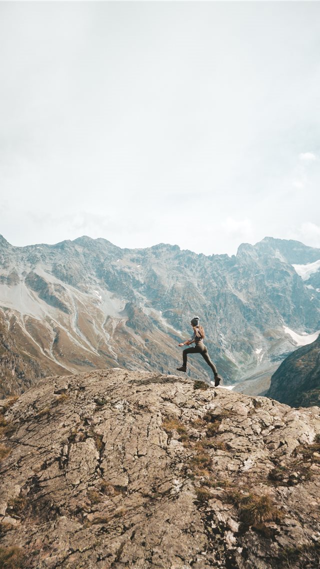 640x1136 person standing on mountain scenery - france iPhone Wallpaper