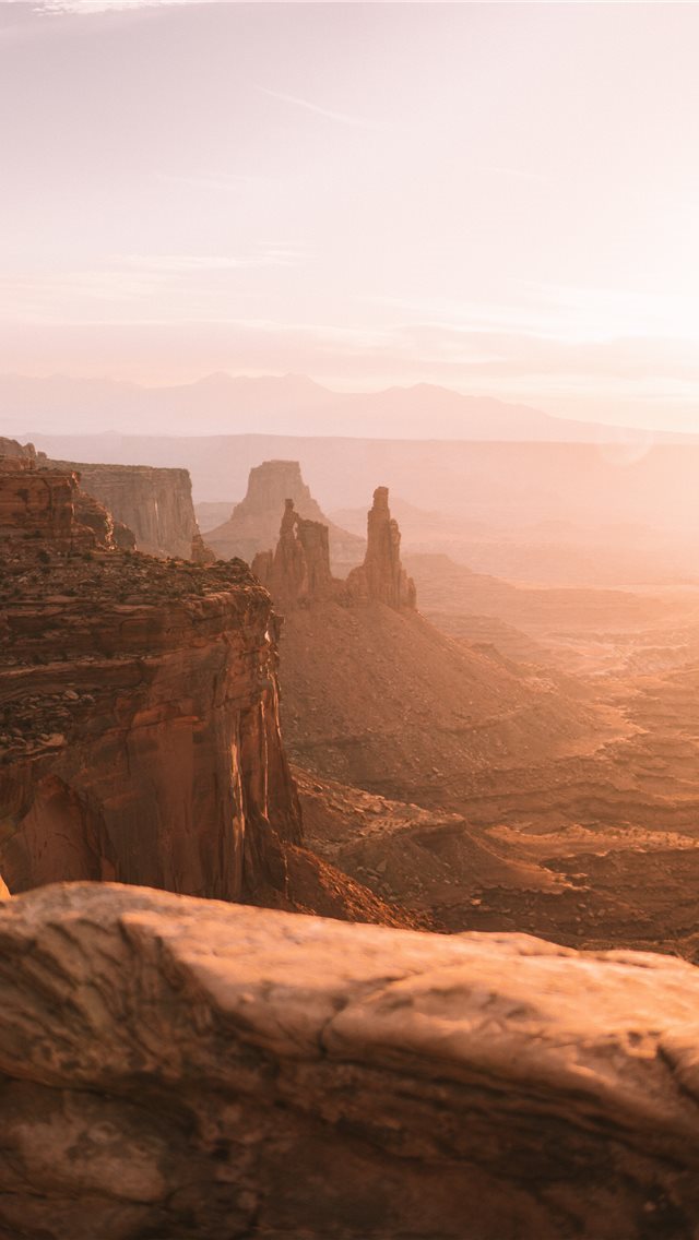 640x1136 brown rock formation at daytime - desert iPhone Wallpaper