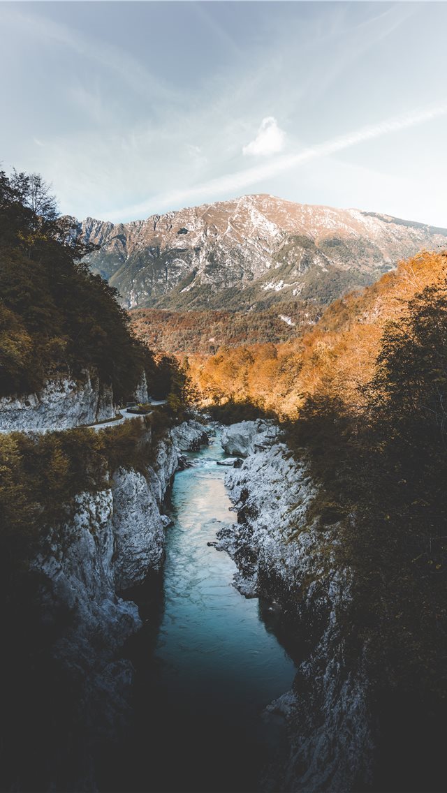 640x1136 body of water between rock cliffs - autumn iPhone Wallpaper