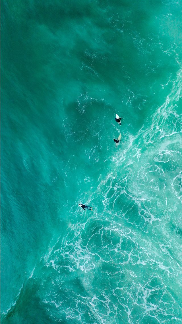 640x1136 aerial photography of surfers on sea - teal iPhone Wallpaper