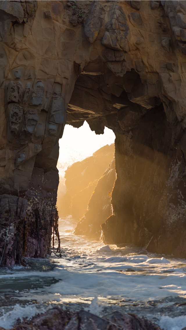 natural arch at the beach iPhone wallpaper 