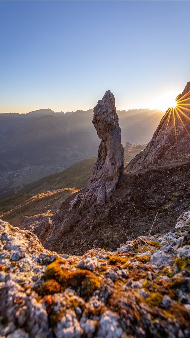 640x1136 stone formation during daytime - switzerland iPhone Wallpaper
