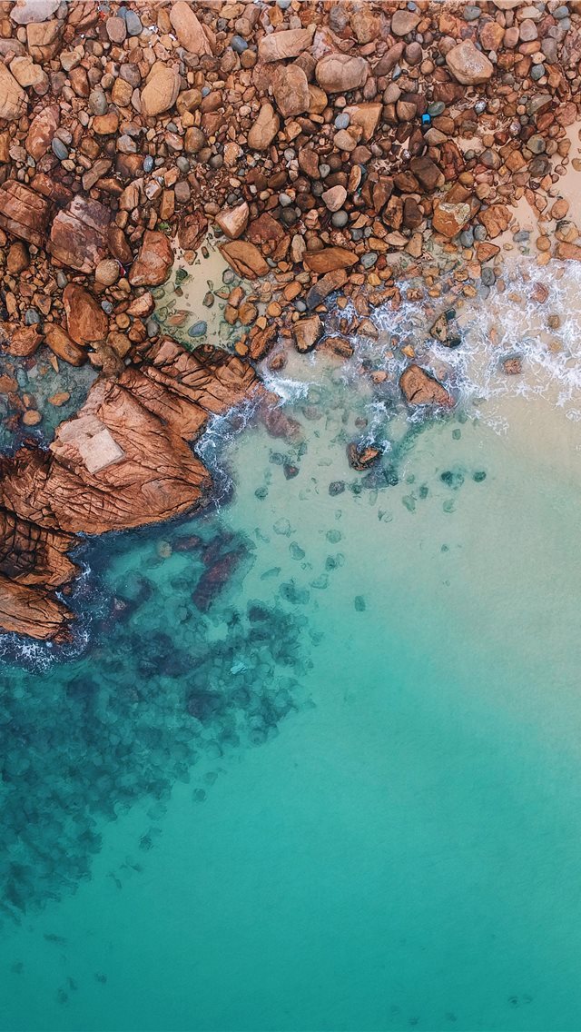 640x1136 clear blue sea and rocks - hong kong iPhone Wallpaper
