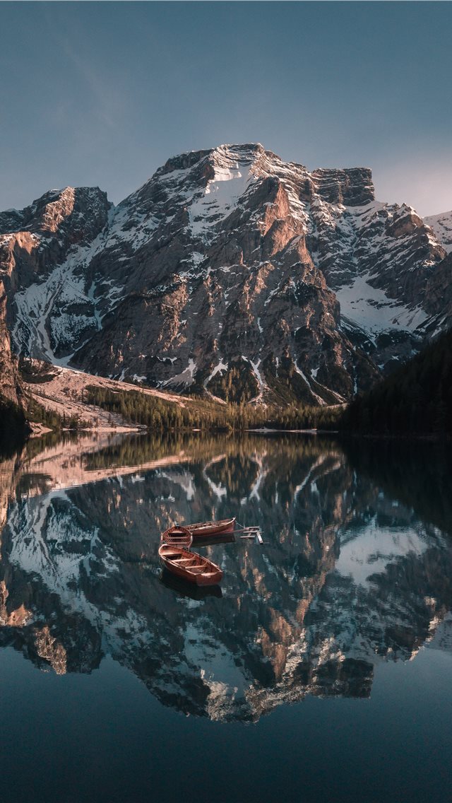 640x1136 empty boats on body of water near glacier mountain... - italy iPhone Wallpaper