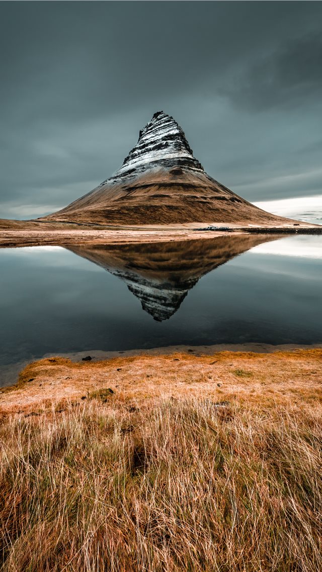 cone mountain with the distance of body of water iPhone wallpaper 