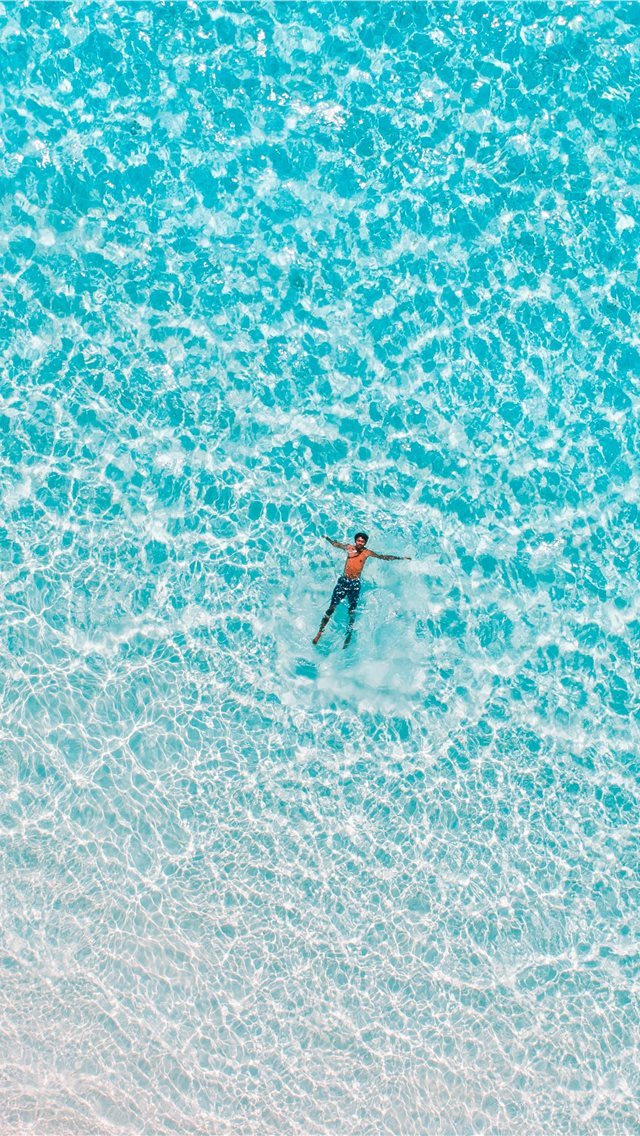 640x1136 bird's eye view of man on body water - thoddoo iPhone Wallpaper