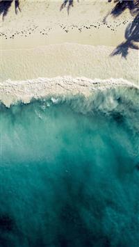 aerial photography of sea shore wallpaper