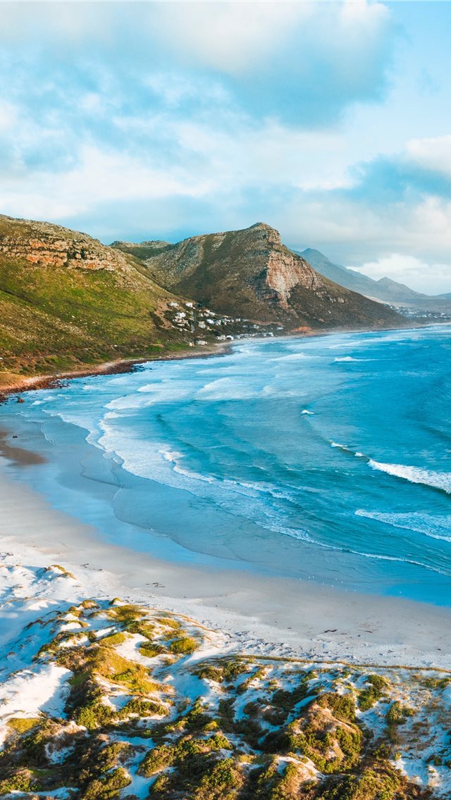 640x1136 body of water near mountain - 45 lighthouse rd iPhone Wallpaper