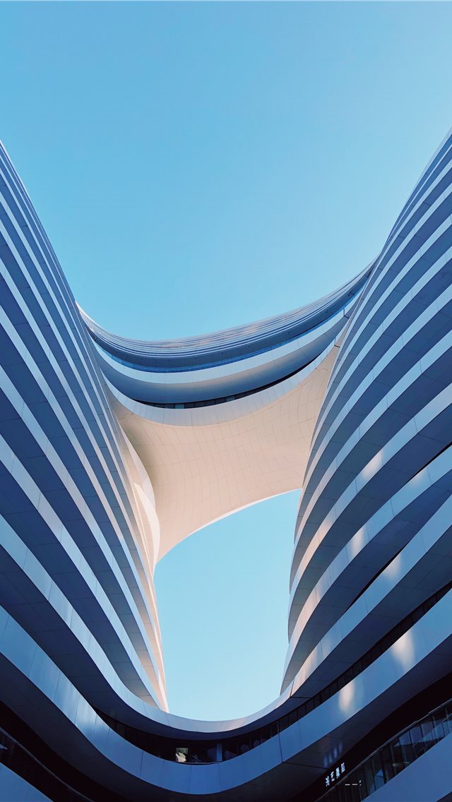 640x1136 white concrete building during daytime - window iPhone Wallpaper