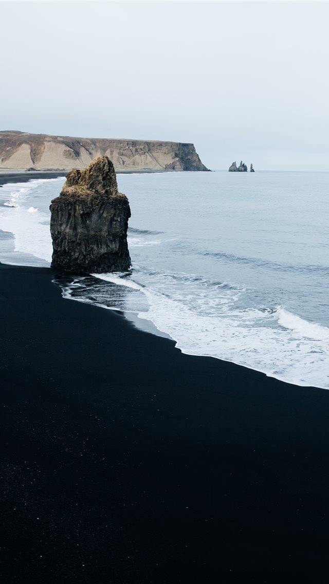 640x1136 brown monolith rock on seashore - iceland iPhone Wallpaper