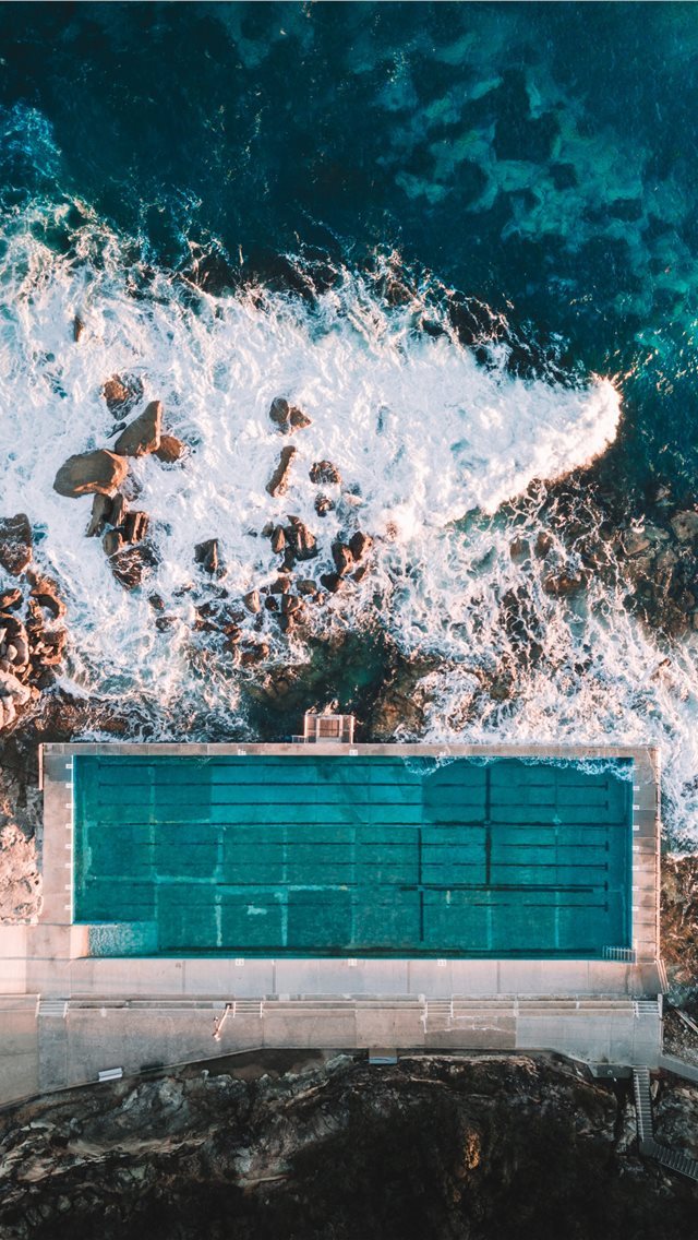 640x1136 aerial photo of concrete building near sea - australia iPhone Wallpaper