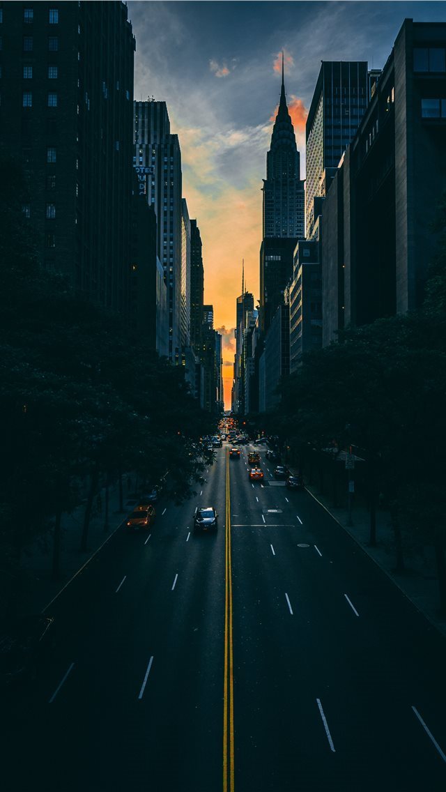 640x1136 low light photography of vehicle crossing road bet... - manhattan iPhone Wallpaper
