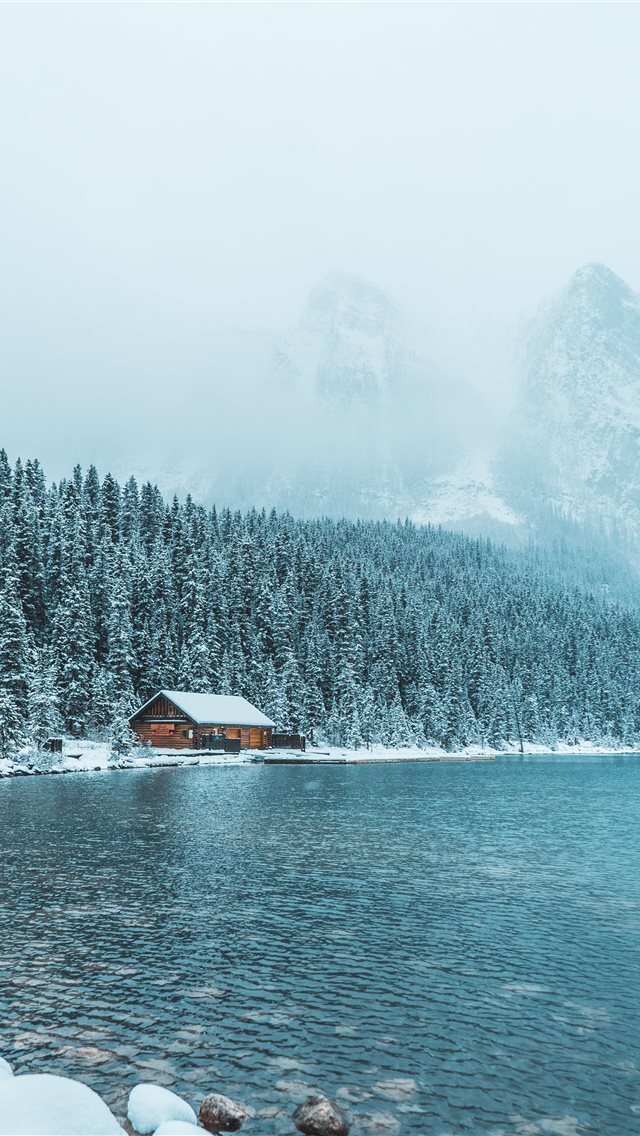 640x1136 brown wooden house between trees and body of water... - canada iPhone Wallpaper