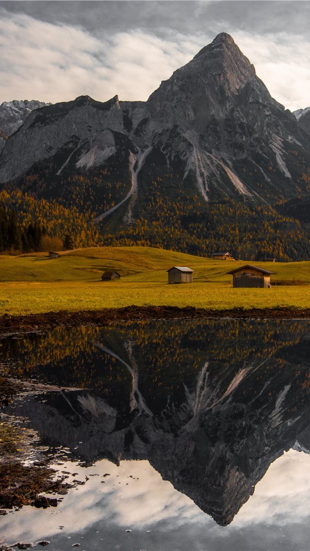 640x1136 cabins in field - austria iPhone Wallpaper